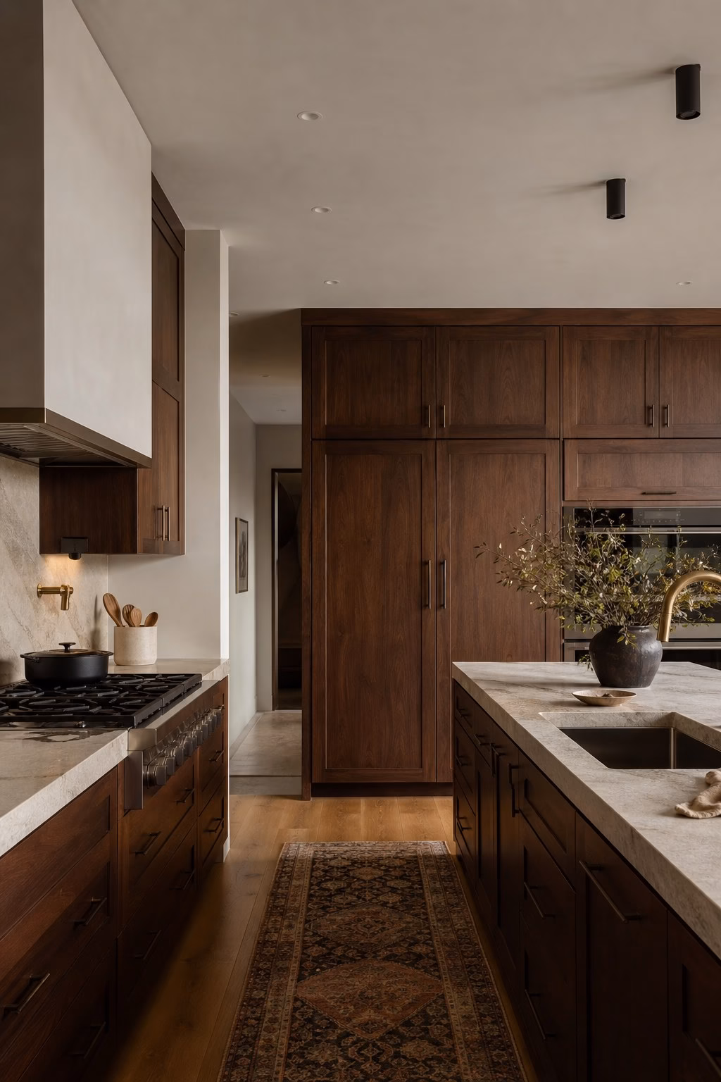 Moody walnut kitchen cabinets creating a richer home interior