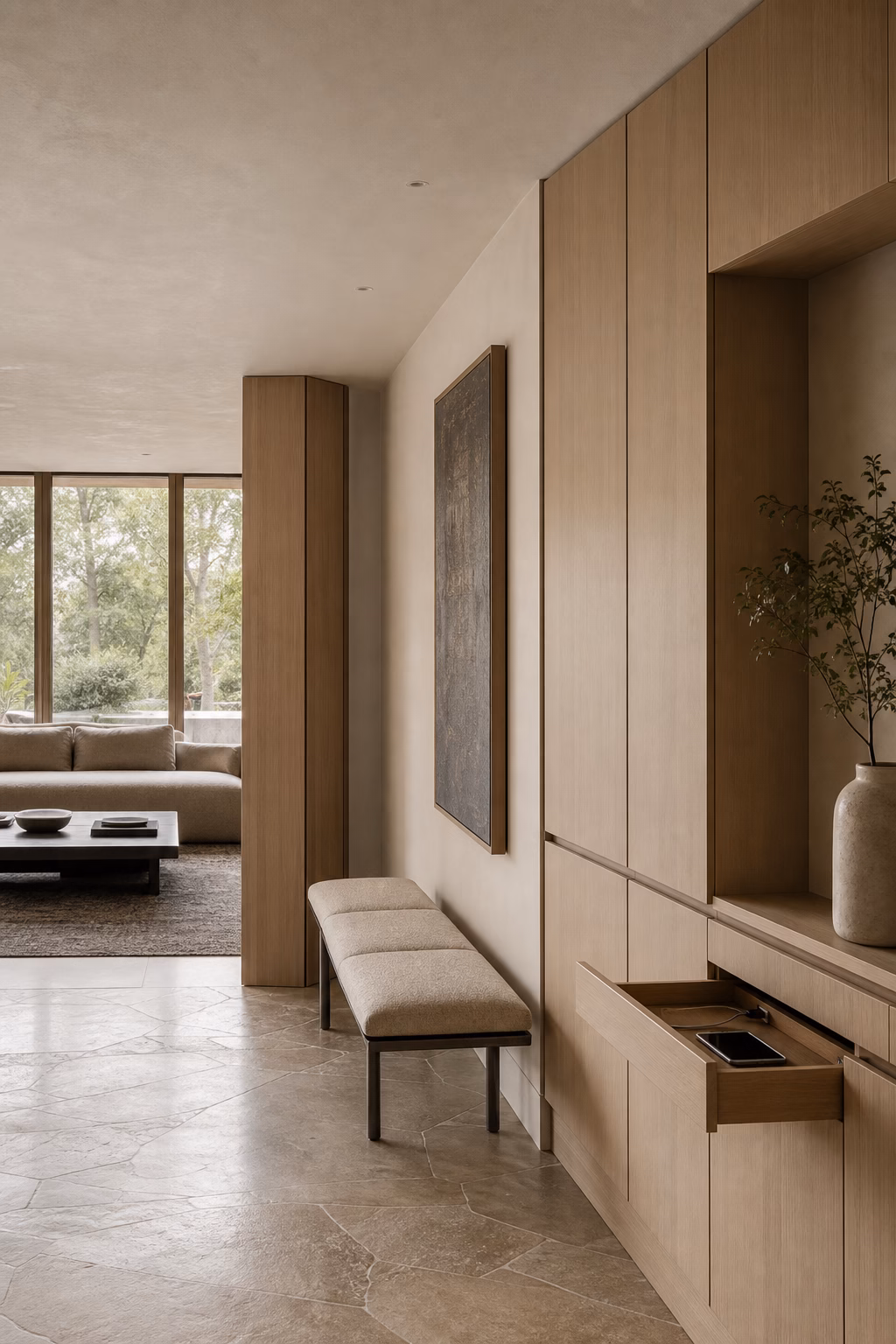 Handleless built-in storage creating a sleek modern entry and living area