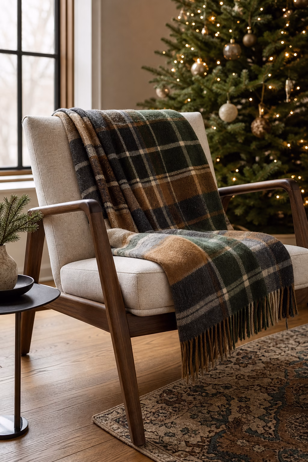 Muted plaid wool throw adding festive warmth to a lounge chair