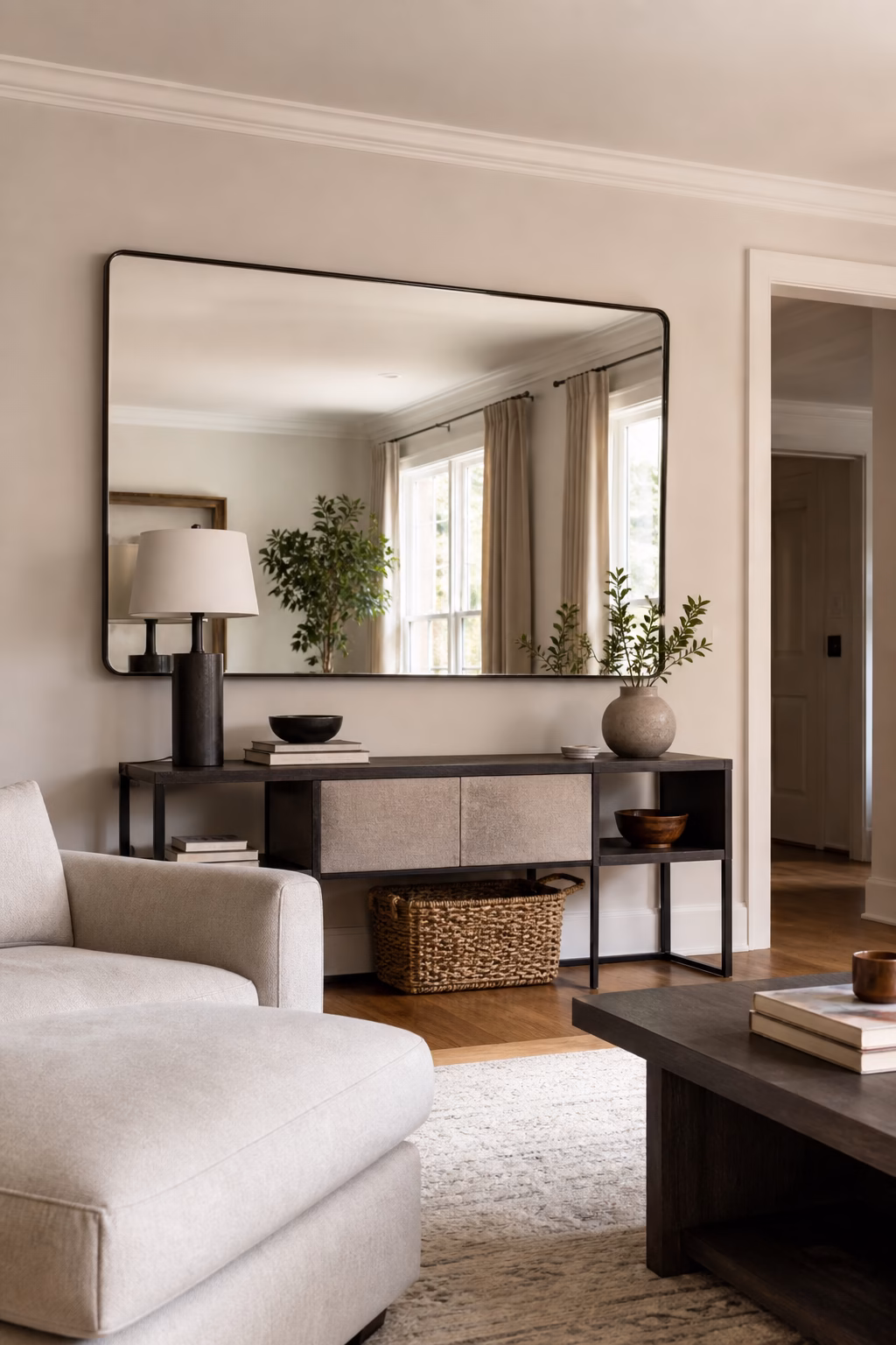 Cozy home interior with sculptural indoor tree branches and natural materials