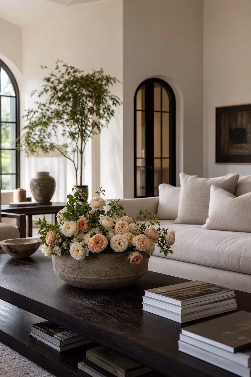Low bowl vase arrangement keeping fresh flowers below conversation height