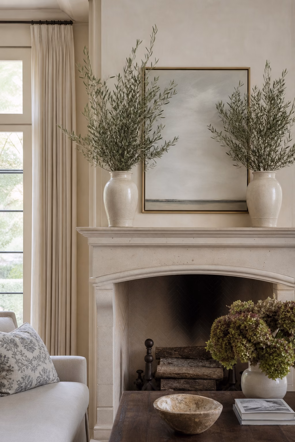 Paired decorative vases arranged deliberately on a sideboard