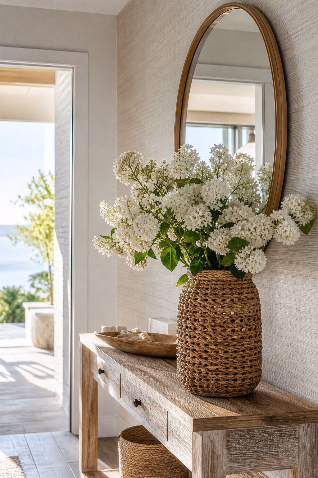 Rattan wrapped vase adding casual texture to fresh flowers