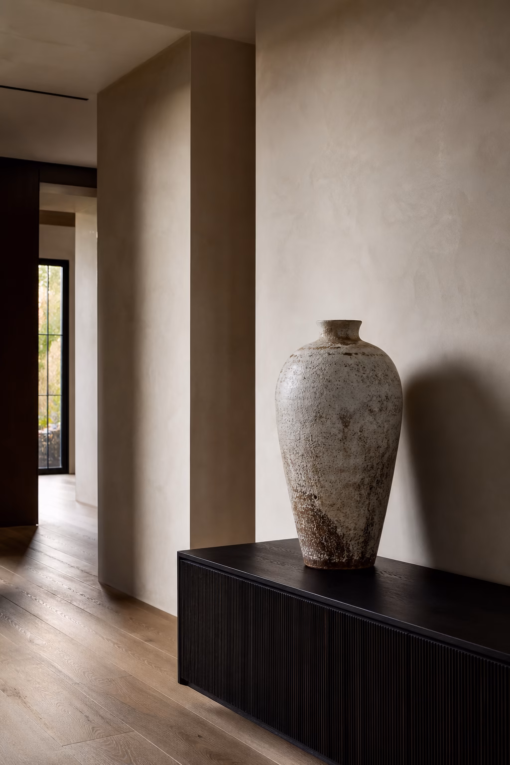 Empty sculptural vase styled as living room decor