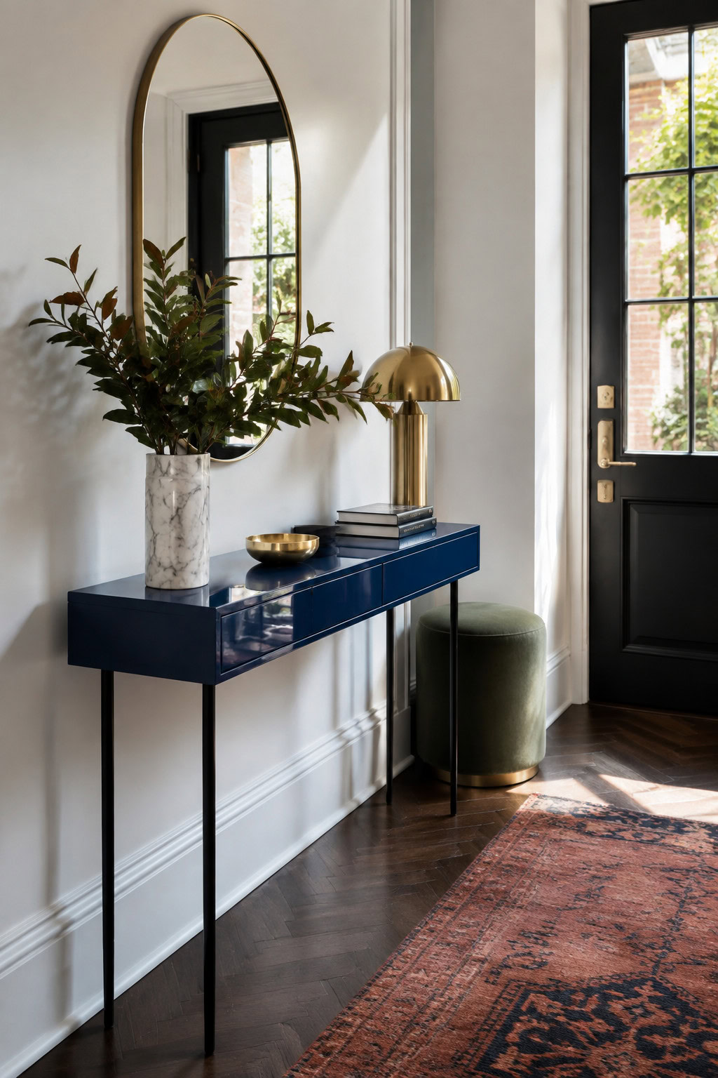 High-gloss cobalt-blue narrow console in a modern entryway