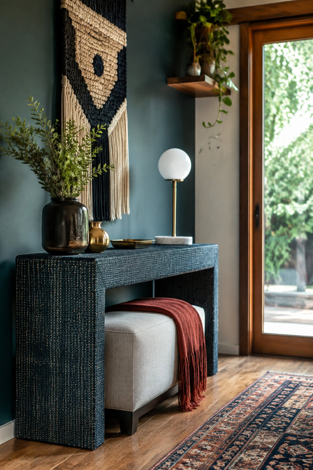 Narrow console with a textured fabric entryway bench